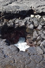Water filling a crevice in the the lava field
