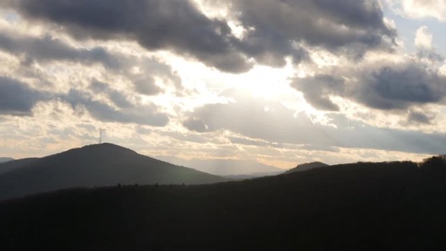 Time Lapse as the sun sets with Mount Mitchell in the distant background.  Video from backside of Grandfather Mountain