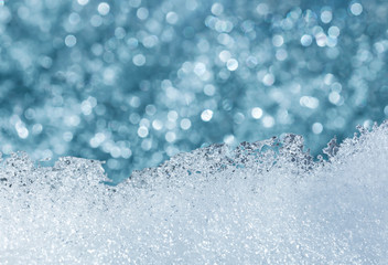Naklejka na ściany i meble icy melting snow pattern with blurred lights