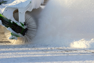 special machine for snow removal cleans the road