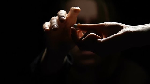 Ugly woman taking pill from dealer hand, inability to withstand to addiction