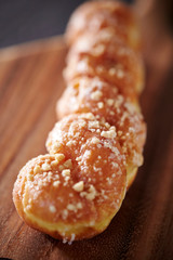 Twisted donuts on table 