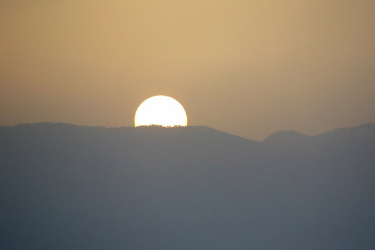 Fototapeta sunrise on top of a mountain