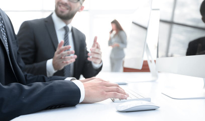 business colleagues sitting at their Desk