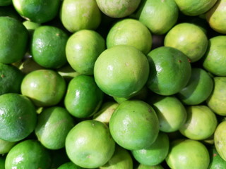 Fresh lime. colorful background texture.