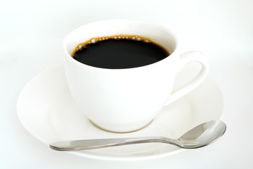 Hot black coffee in white glass and spoon on isolated white background .Food concepts and Lifestyle