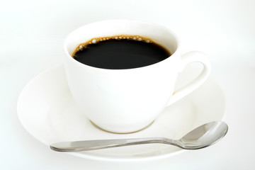Hot black coffee in white glass and spoon on isolated white background .Food concepts and Lifestyle