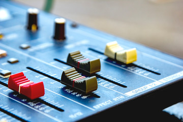 Slide the volume control sound audio mixer.