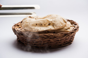 Chapati / Tava Roti also known as Indian bread or Fulka/phulka. Main ingredient of lunch/dinner in India/Pakistan. selective focus