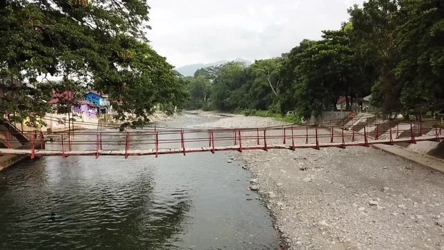 Drone view of the suspension bridge in Bukit Lawan National Park in Sumatra, Indonesia