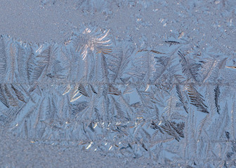 Macro images of frost pattern on window during polar vortex