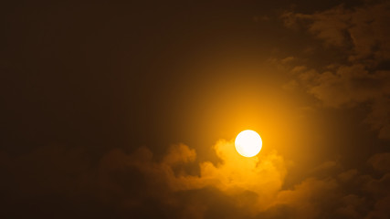 Moon from distance and clouds
