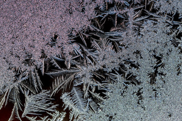 Macro images of frost pattern on window during polar vortex