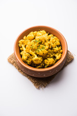Dry Gobi Masala/ cauliflower Sabzi served in a bowl. selective focus