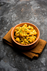 Dry Gobi Masala/ cauliflower Sabzi served in a bowl. selective focus