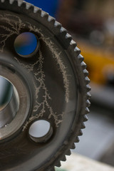 A beautiful effect on the gears in the process of nitriding to obtain a solid surface layer of metal.