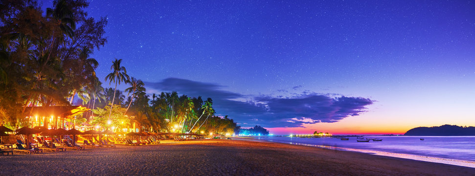 Beautiful evening panoramic view of tropical beach on the resort coast in Ngapali, Myanmar.