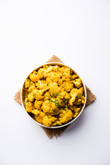 Dry Gobi Masala/ cauliflower Sabzi served in a bowl. selective focus