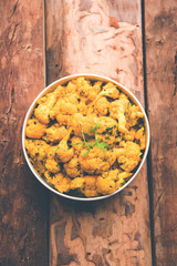 Dry Gobi Masala/ cauliflower Sabzi served in a bowl. selective focus