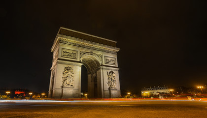 Fototapeta na wymiar Triumphal Arch at evening in Paris, France