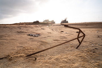Anchor at beach sand