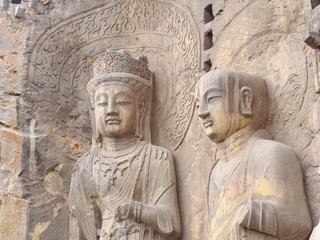 Luoyang Longmen grottoes. Broken Buddha and the stone caves and sculptures in the Longmen Grottoes in Luoyang, China. Taken in 14th October 2018