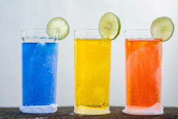 set cold cocktails and soft drinks on white background