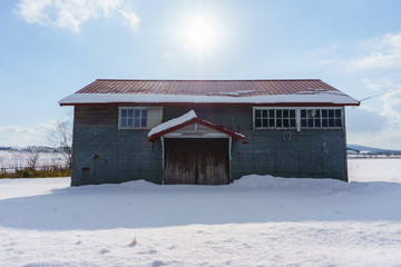 Beautiful Winter Landscape with powder snow on a road in, Hokkaido Japan