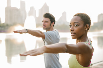 Yoga couple in the park