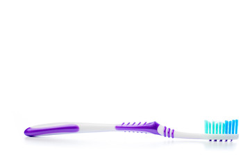 colored toothbrush on an isolated background, close up