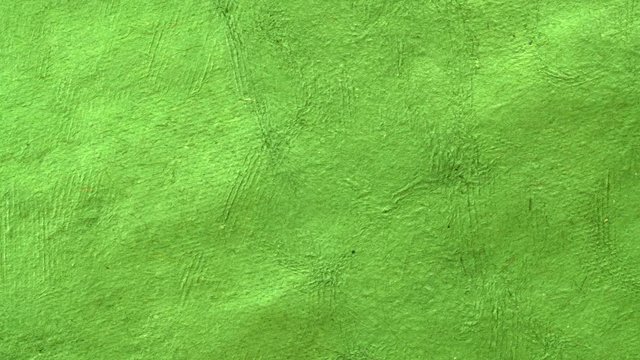 background of green handmade Huun paper created by Mayan artisans in Mexico from a tree bark -diagonal pan