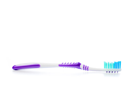 colored toothbrush on an isolated background, close up