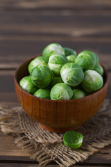 cabbage sprouts on wooden surface