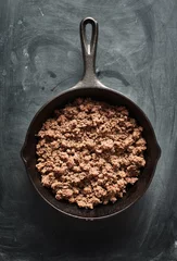 cooked ground beef in cast iron skillet flat lay composition © Joshua Resnick