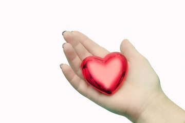 Obraz na płótnie Canvas Heart in hand. Valentine's day. Feast of lovers.