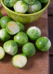 cabbage sprouts on wooden surface