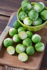 cabbage sprouts on wooden surface