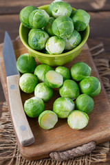 cabbage sprouts on wooden surface