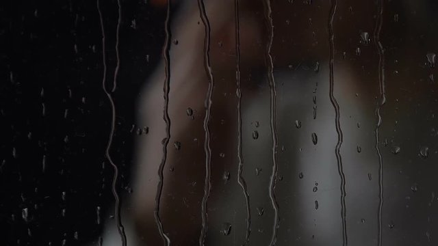 Woman with withdrawal syndrome taking pill of antidepressant, smoking cigarette