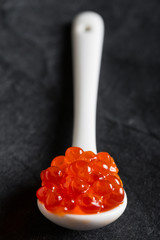Red salted caviar on a spoon © Ruslan Mitin