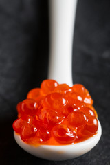 Red salted caviar on a spoon © Ruslan Mitin