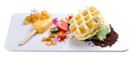 Dessert with waffle and creme brulee on a white background