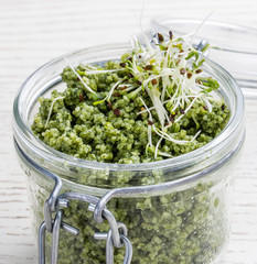 Couscous with lucerne in a glass jar