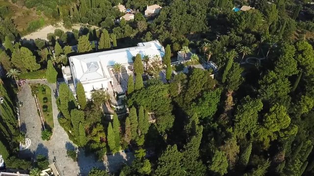 Aerial drone video of iconic Palace of Achileion former residence Empress Elisabeth of Austria (known as 'Sissi') and Kaiser William II of Germany, Corfu, Greece