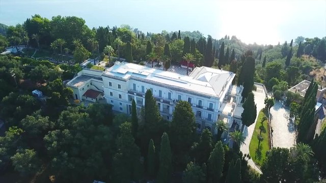 Aerial drone video of iconic Palace of Achileion former residence Empress Elisabeth of Austria (known as 'Sissi') and Kaiser William II of Germany, Corfu, Greece