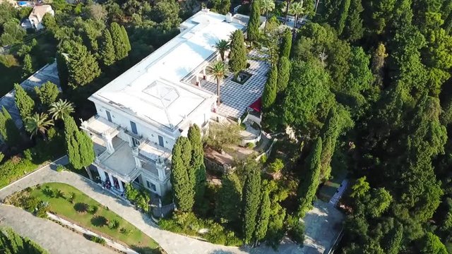 Aerial drone video of iconic Palace of Achileion former residence Empress Elisabeth of Austria (known as 'Sissi') and Kaiser William II of Germany, Corfu, Greece
