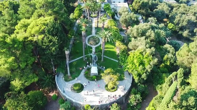 Aerial drone video of iconic Palace of Achileion former residence Empress Elisabeth of Austria (known as 'Sissi') and Kaiser William II of Germany, Corfu, Greece