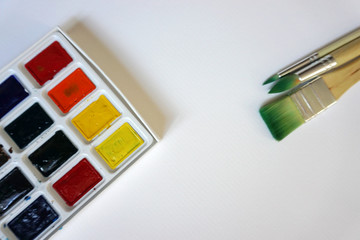 palette with brush and paints