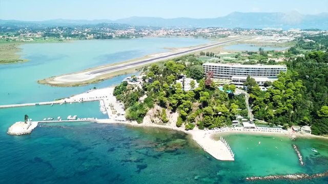 Aerial drone bird's eye view video of famous area of Kanoni near iconic Pontikonissi and airport of Corfu island, Ionian ,Greece