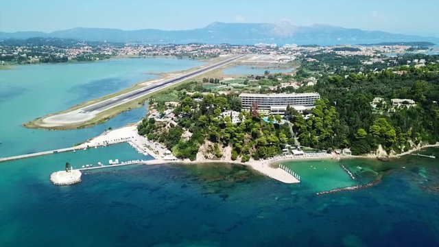 Aerial drone bird's eye view video of famous area of Kanoni near iconic Pontikonissi and airport of Corfu island, Ionian ,Greece